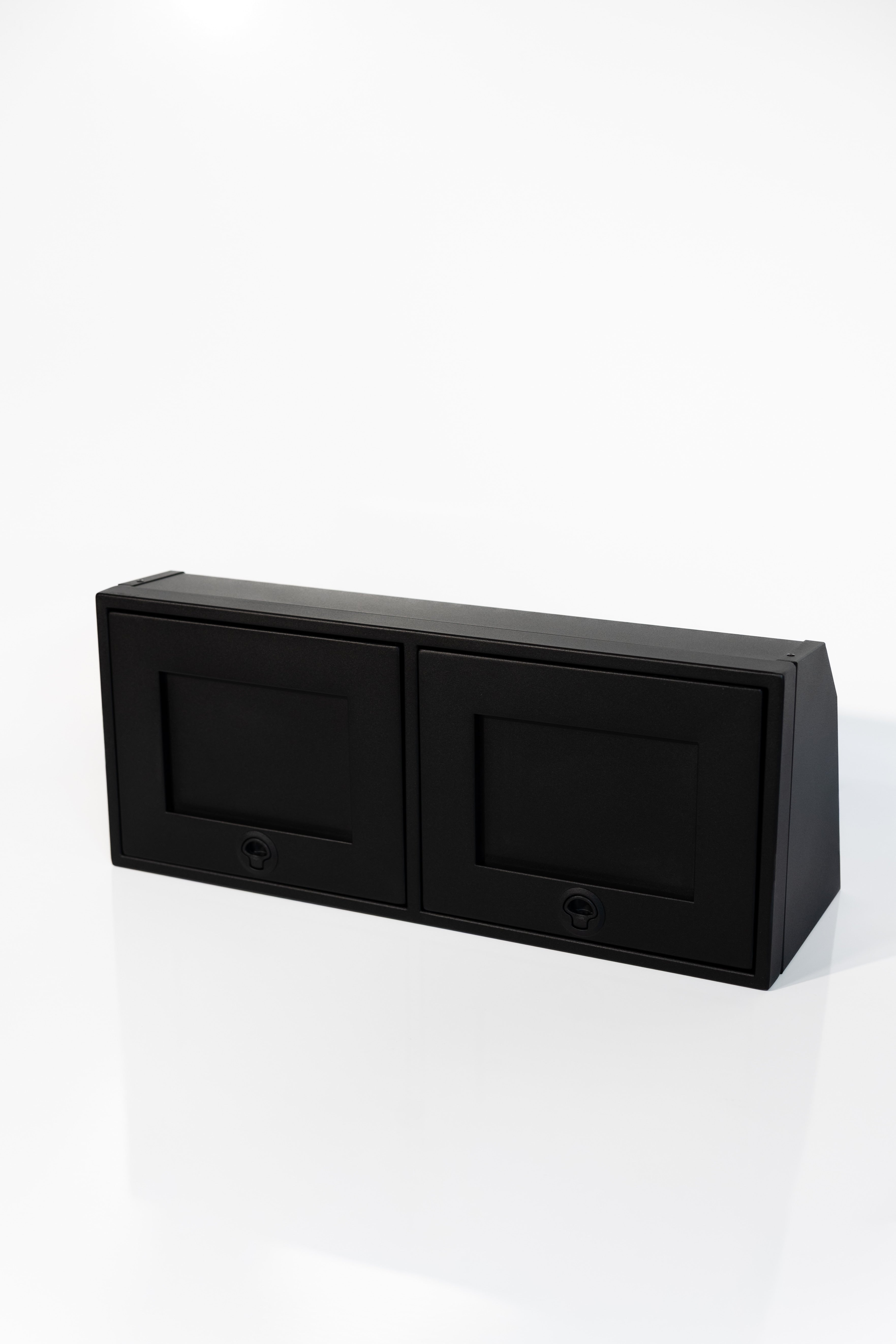 Black 36-inch wide aluminum angled upper Van Wife Components cabinet with two shaker-style doors & flush slam latches