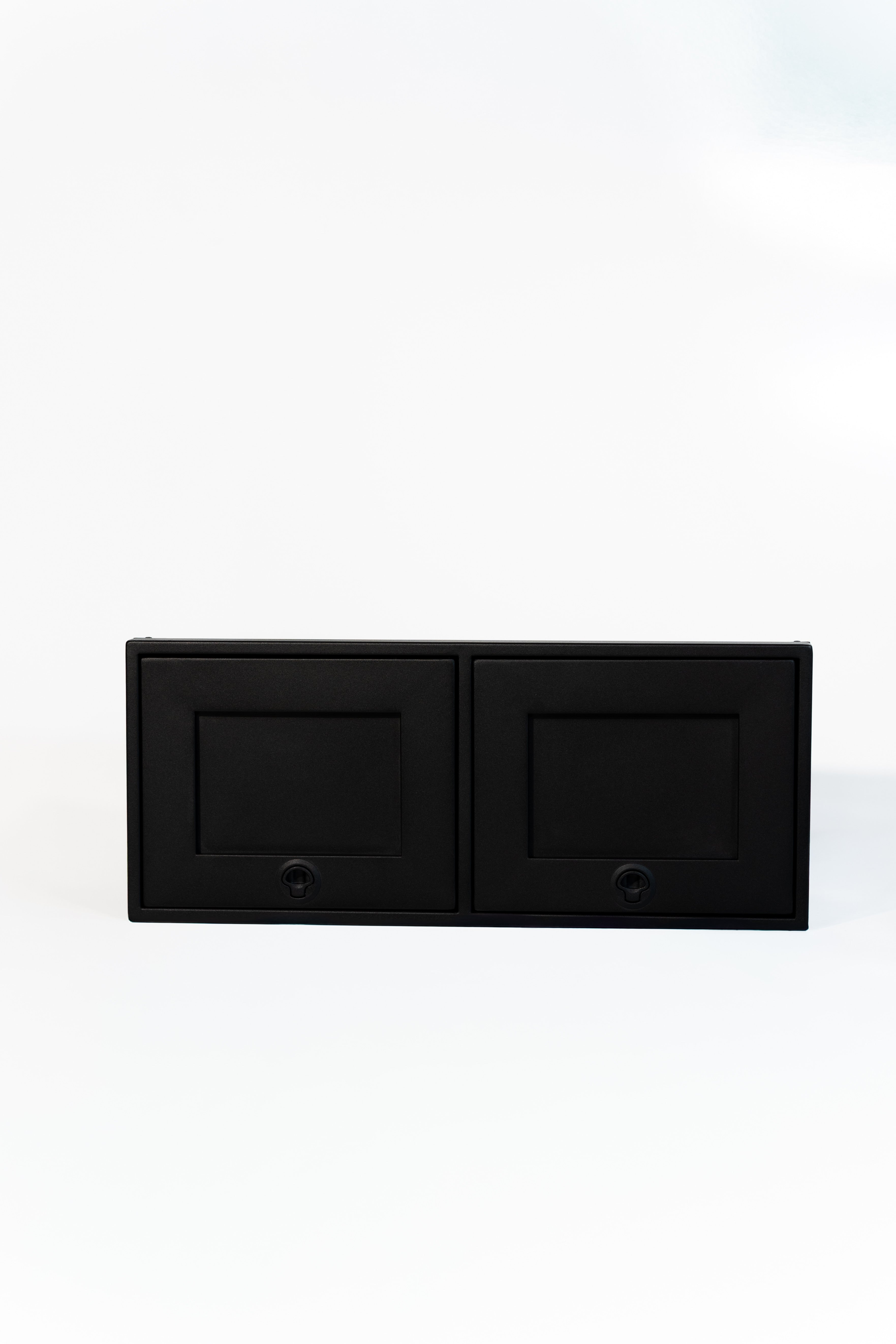 Black 36-inch wide aluminum angled upper Van Wife Components cabinet with two shaker-style doors & flush slam latches