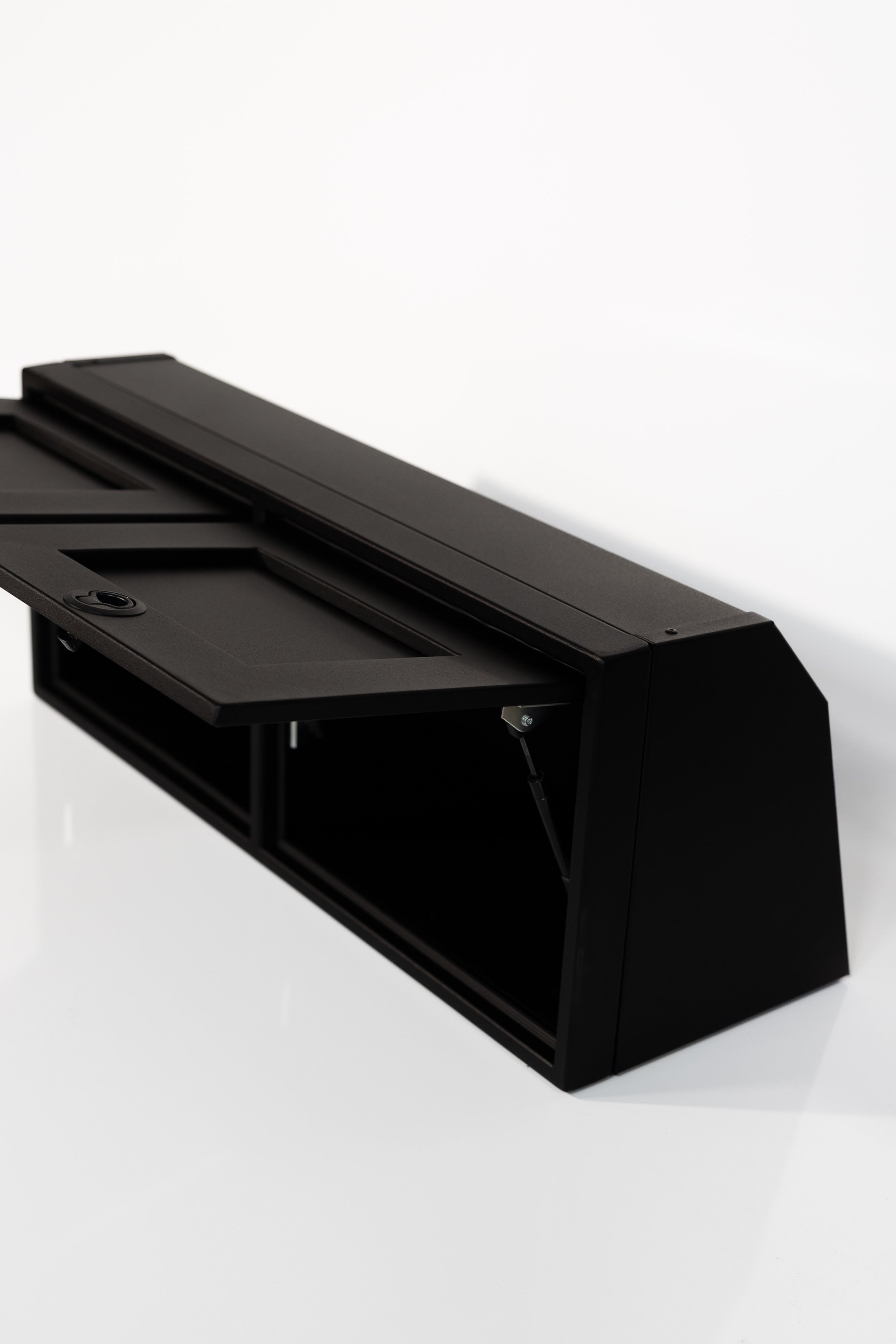 Black 36-inch wide aluminum angled upper Van Wife Components cabinet with two shaker-style doors & flush slam latches