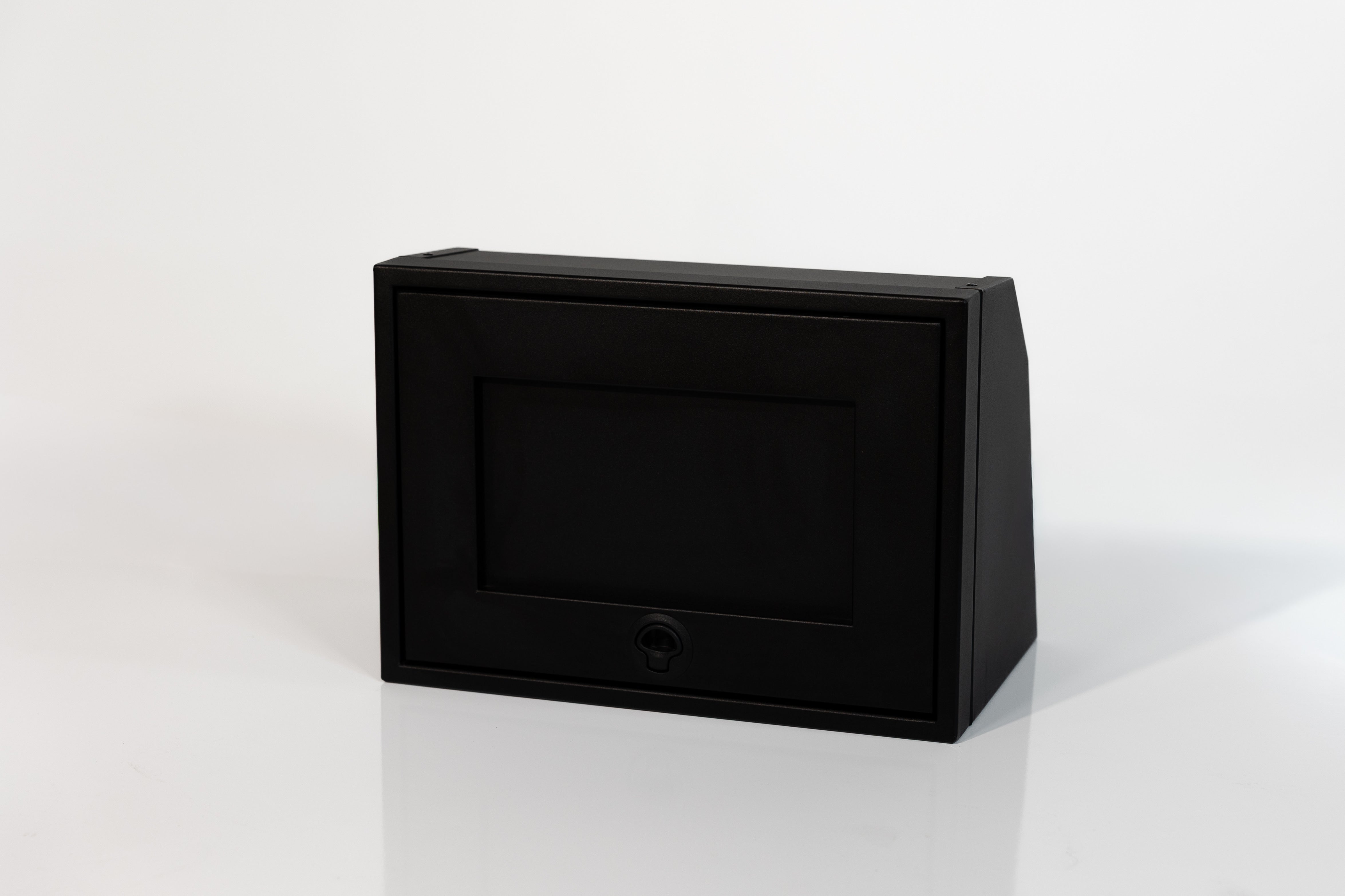 Black 21-inch wide aluminum angled upper Van Wife Components cabinet with a single shaker-style door & flush slam latch
