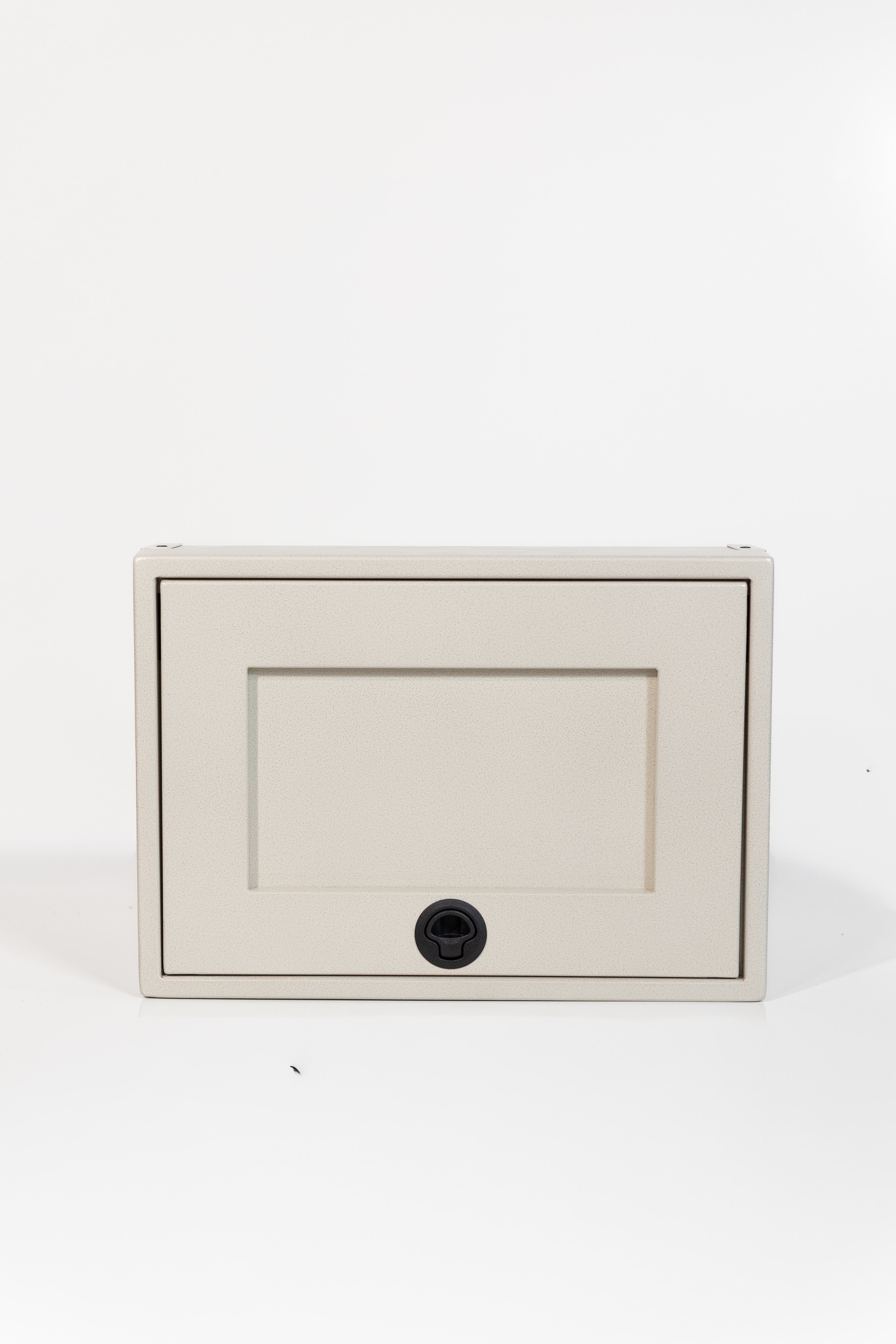 Sandstone 21-inch wide aluminum angled upper Van Wife Components cabinet with a single shaker-style door & flush slam latch