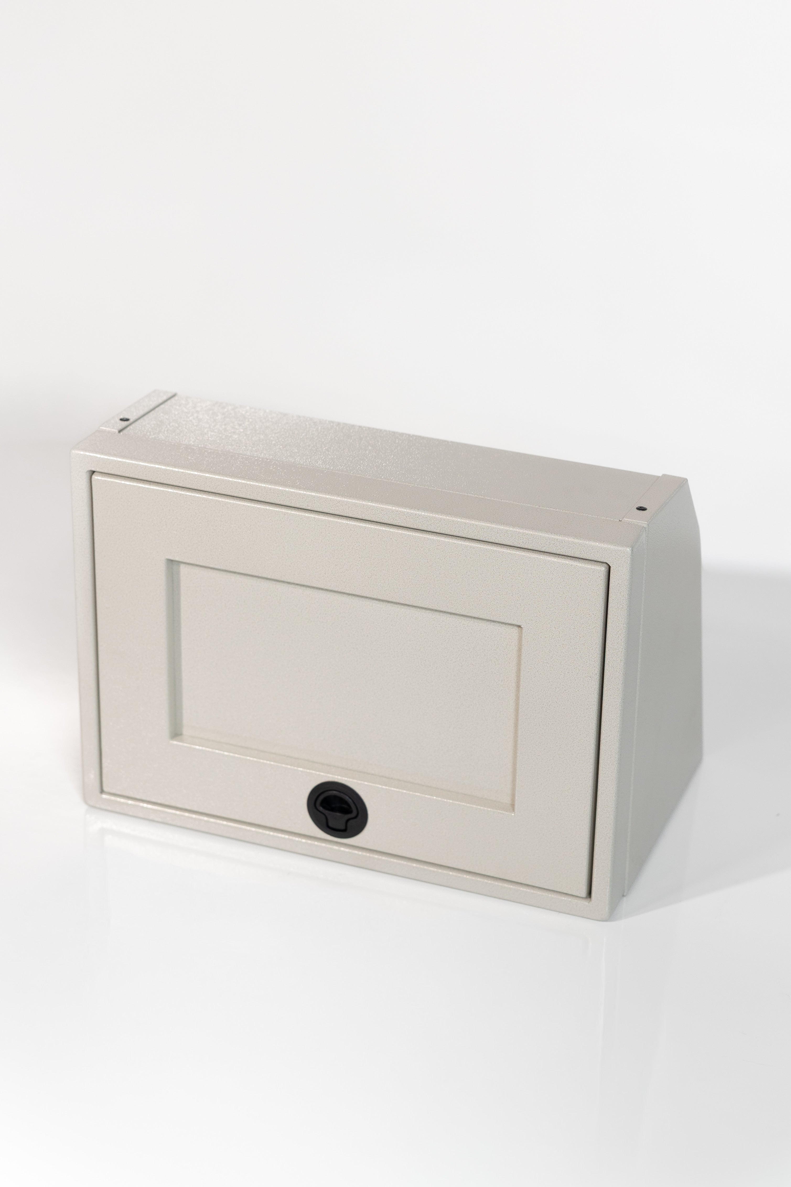 Sandstone 21-inch wide aluminum angled upper Van Wife Components cabinet with a single shaker-style door & flush slam latch