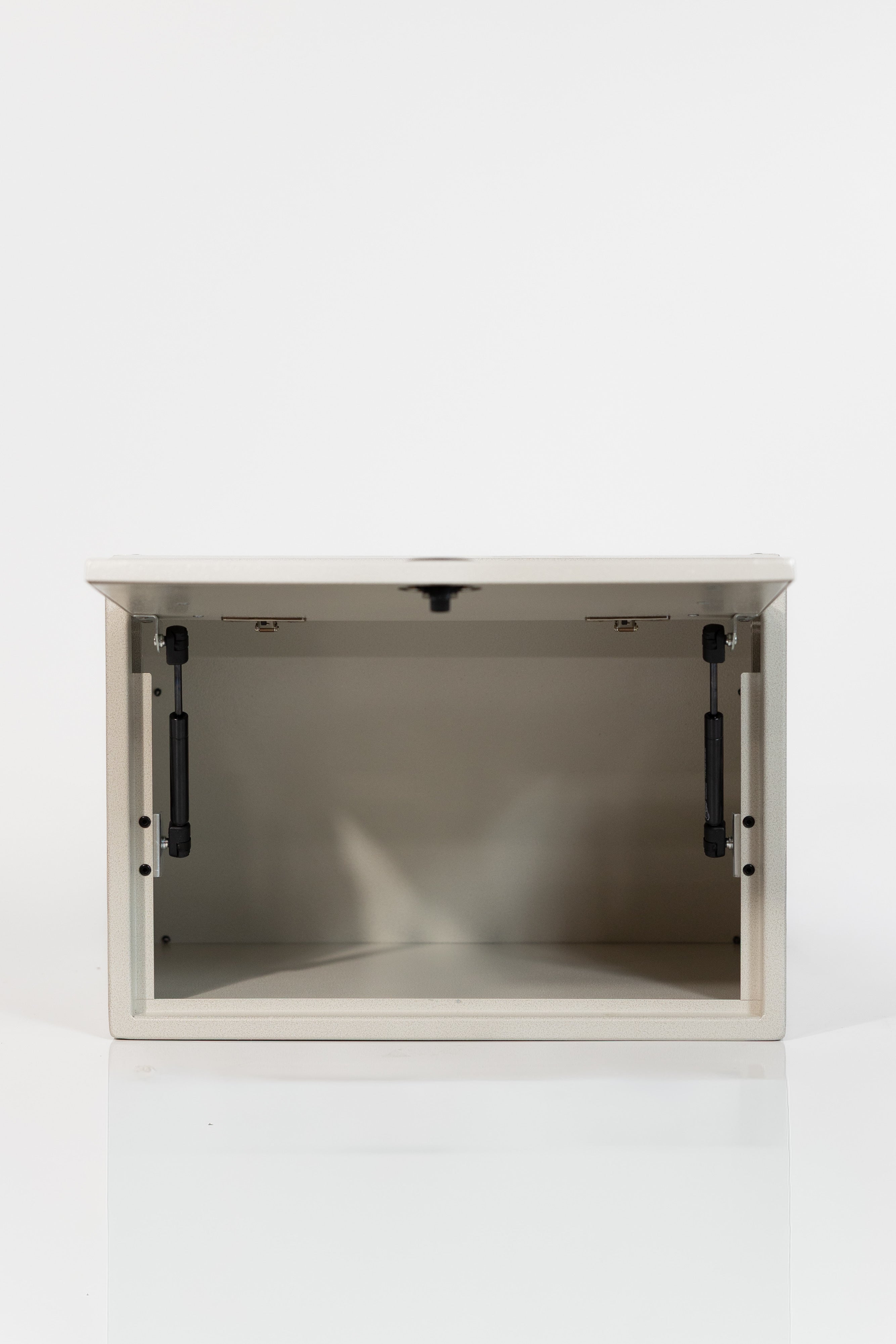 Sandstone 21-inch wide aluminum angled upper Van Wife Components cabinet with a single shaker-style door & flush slam latch