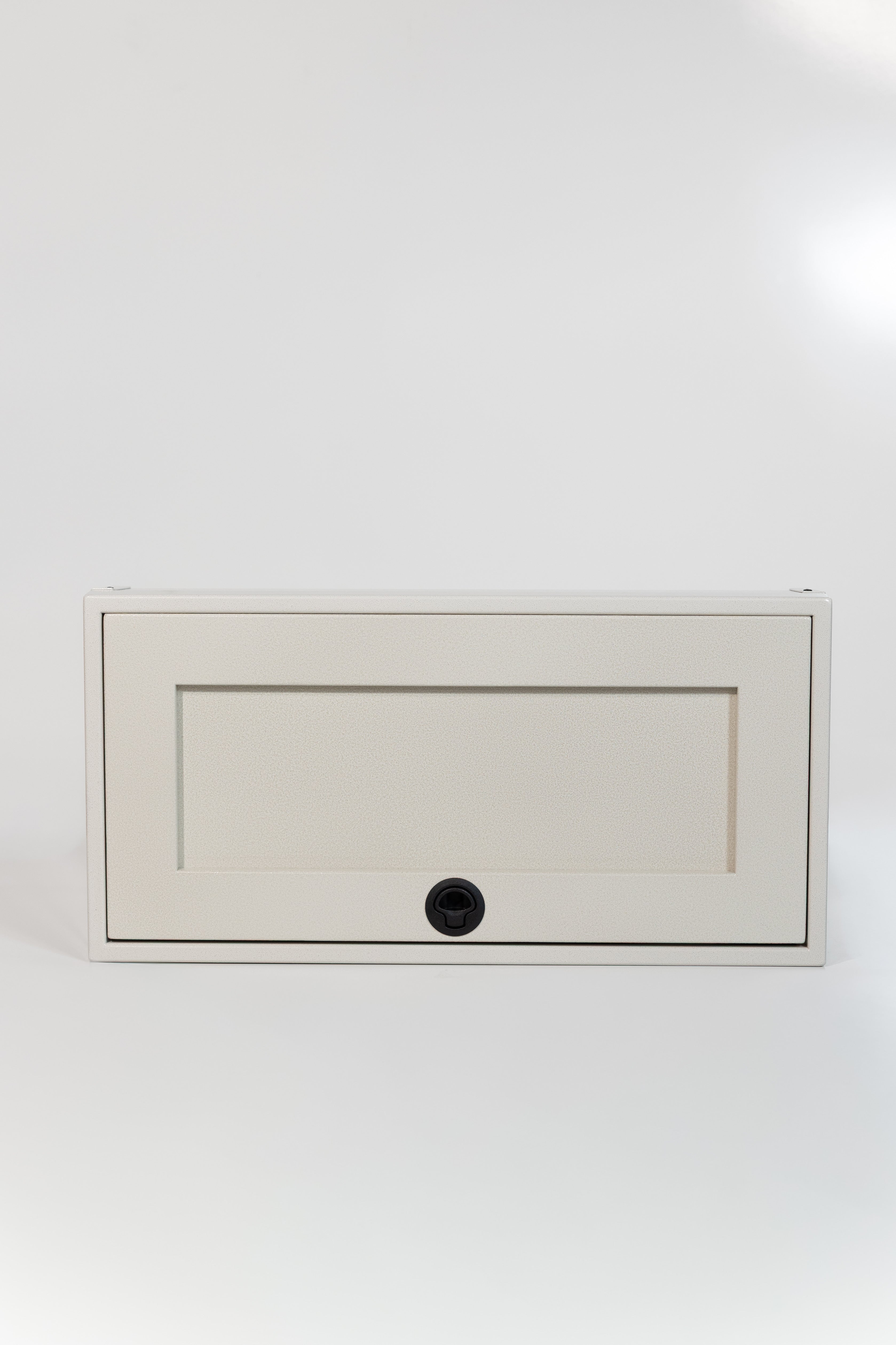 Sandstone 30-inch wide aluminum angled upper Van Wife Components cabinet with a single shaker-style door & flush slam latch