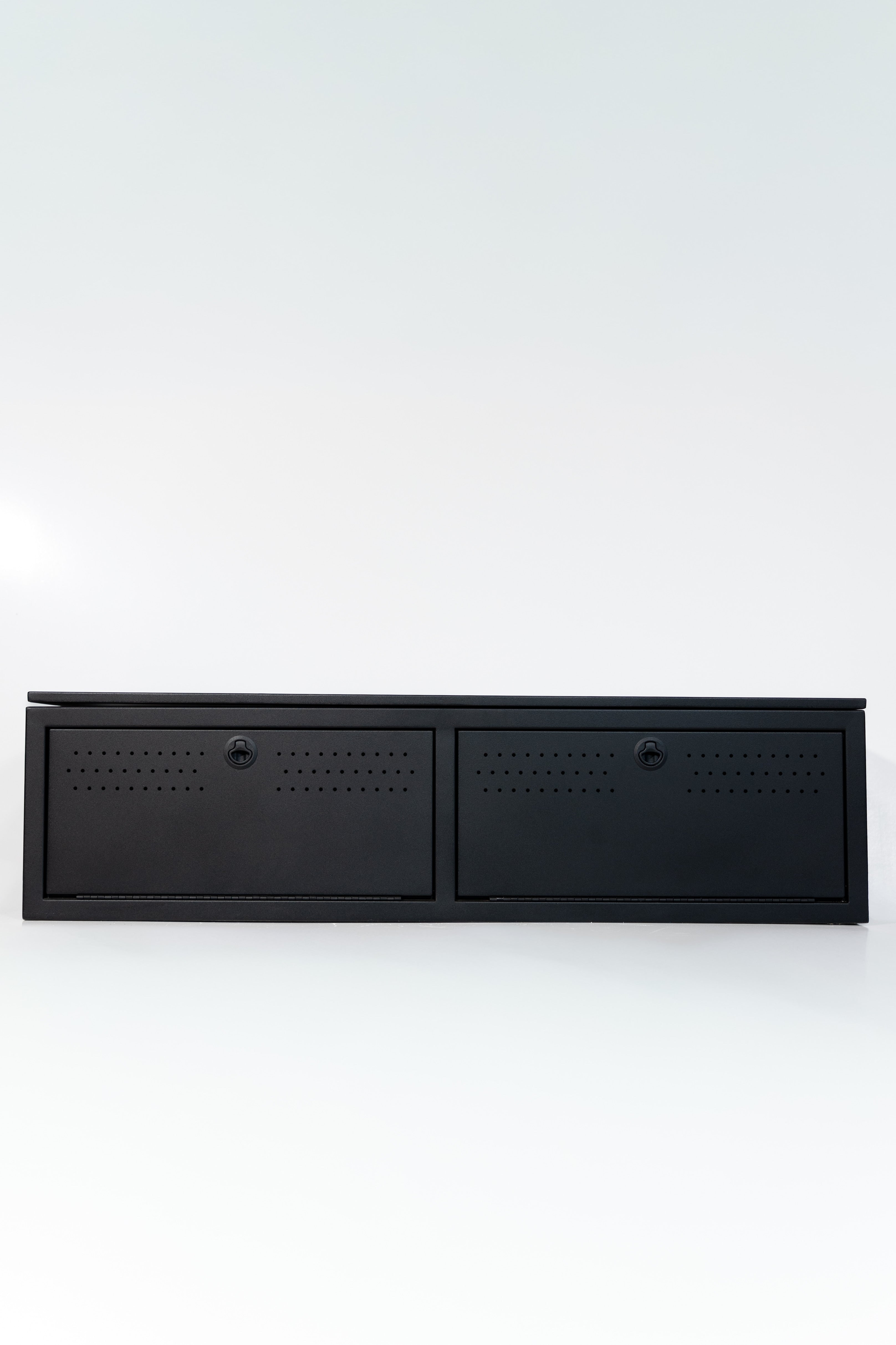 Matte black textured 22" wheel well cover with front drop-down doors and side swing door.