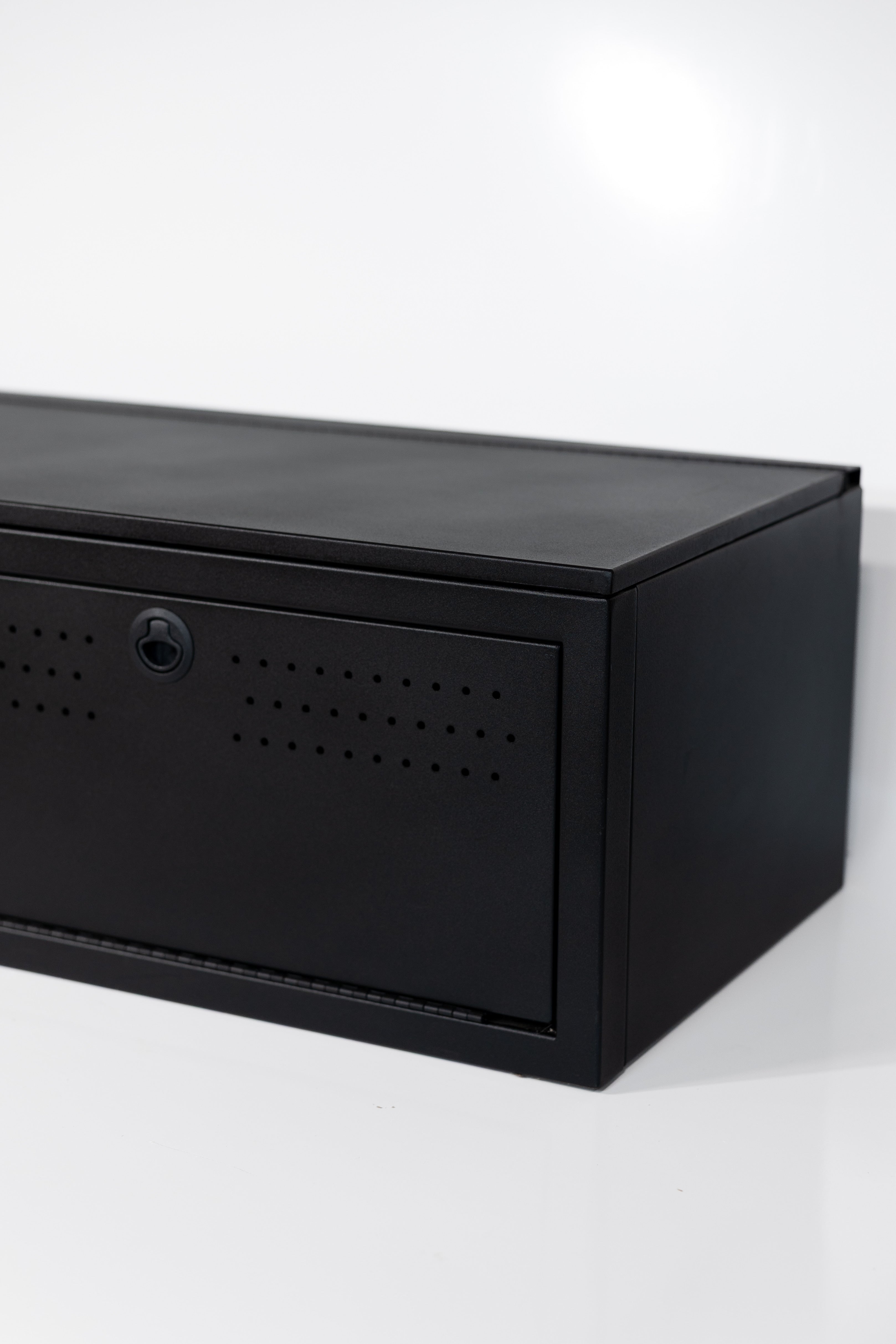 Matte black textured 22" wheel well cover with front drop-down doors and side swing door.