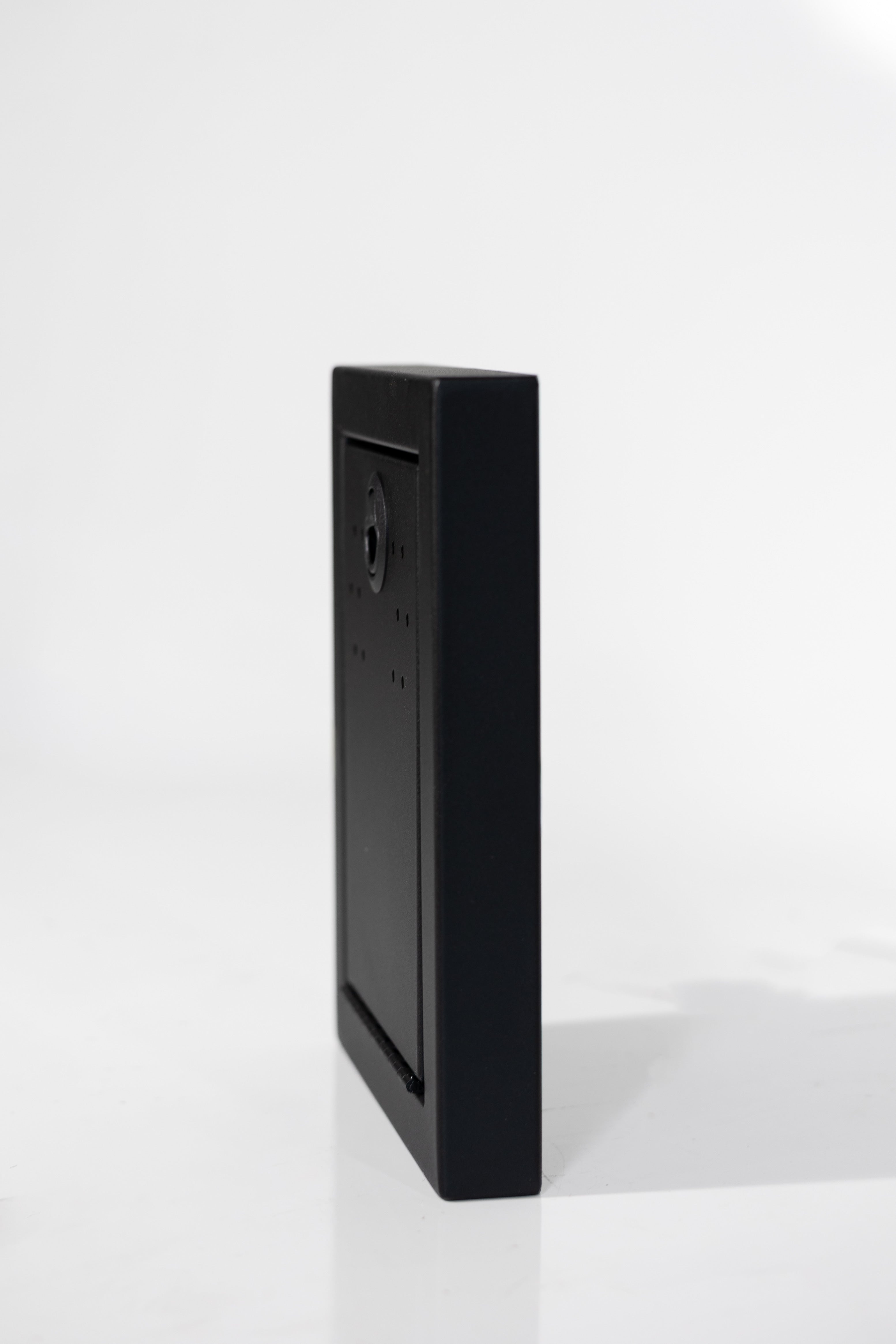 Black Powder-coated aluminum 12-inch face extension with flip-down door for Van Wife Components wheel well covers.