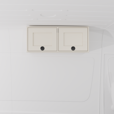 White 36-inch wide aluminum angled upper Van Wife Components cabinet with two shaker-style doors & flush slam latches mounted in a van
