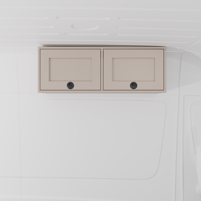 Sandstone 42-inch wide aluminum angled upper Van Wife Components cabinet with two shaker-style doors & flush slam latches mounted in a van
