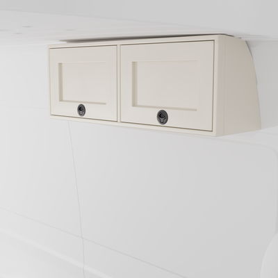 White 42-inch wide aluminum angled upper Van Wife Components cabinet with two shaker-style doors & flush slam latches mounted in a van
