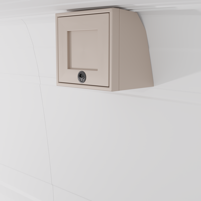 Sandstone 16-inch wide aluminum angled upper Van Wife Components cabinet with a single shaker-style door & flush slam latch mounted in a van