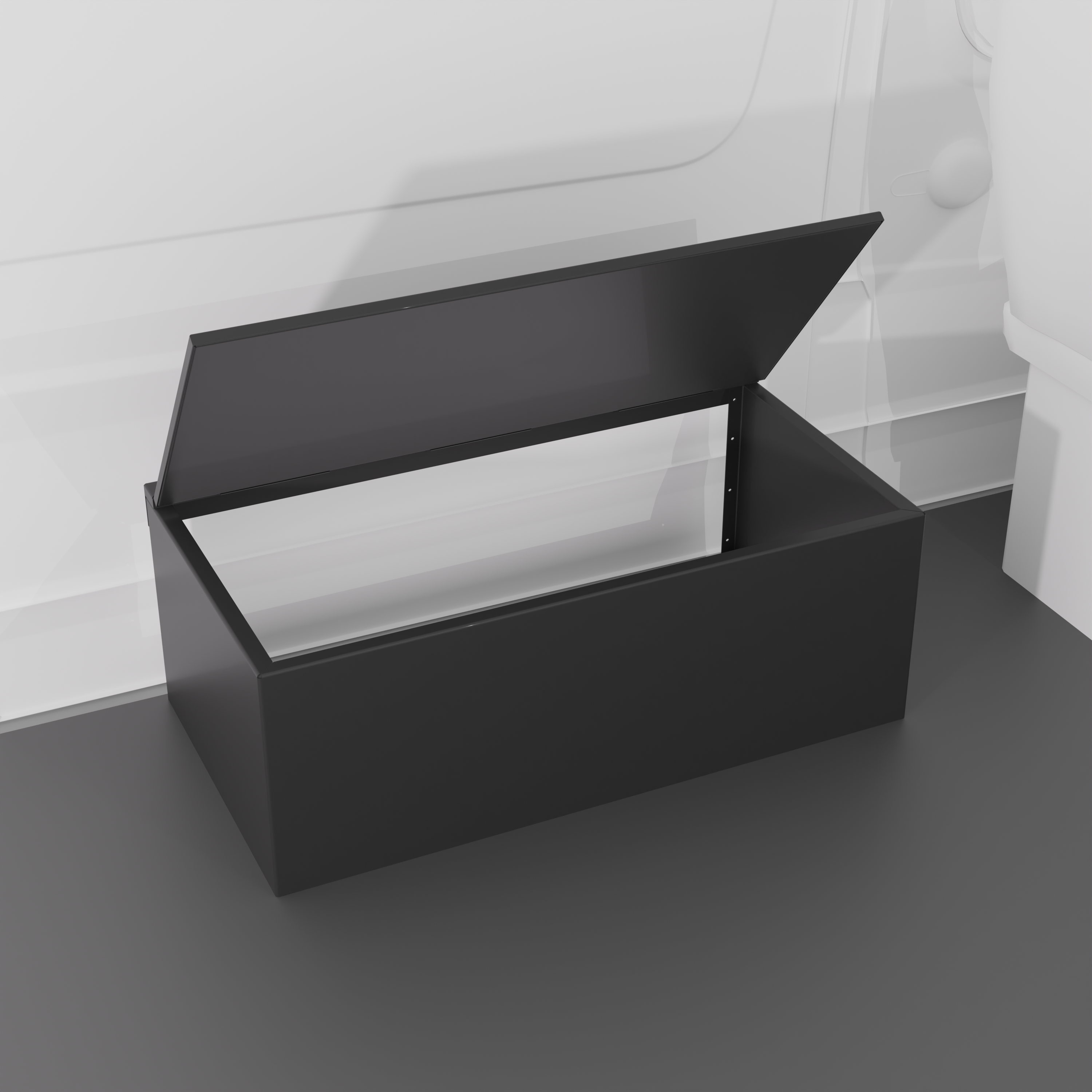 Black 42" x 22” x 16” aluminum storage bench with flip-top lid installed in a van interior.
