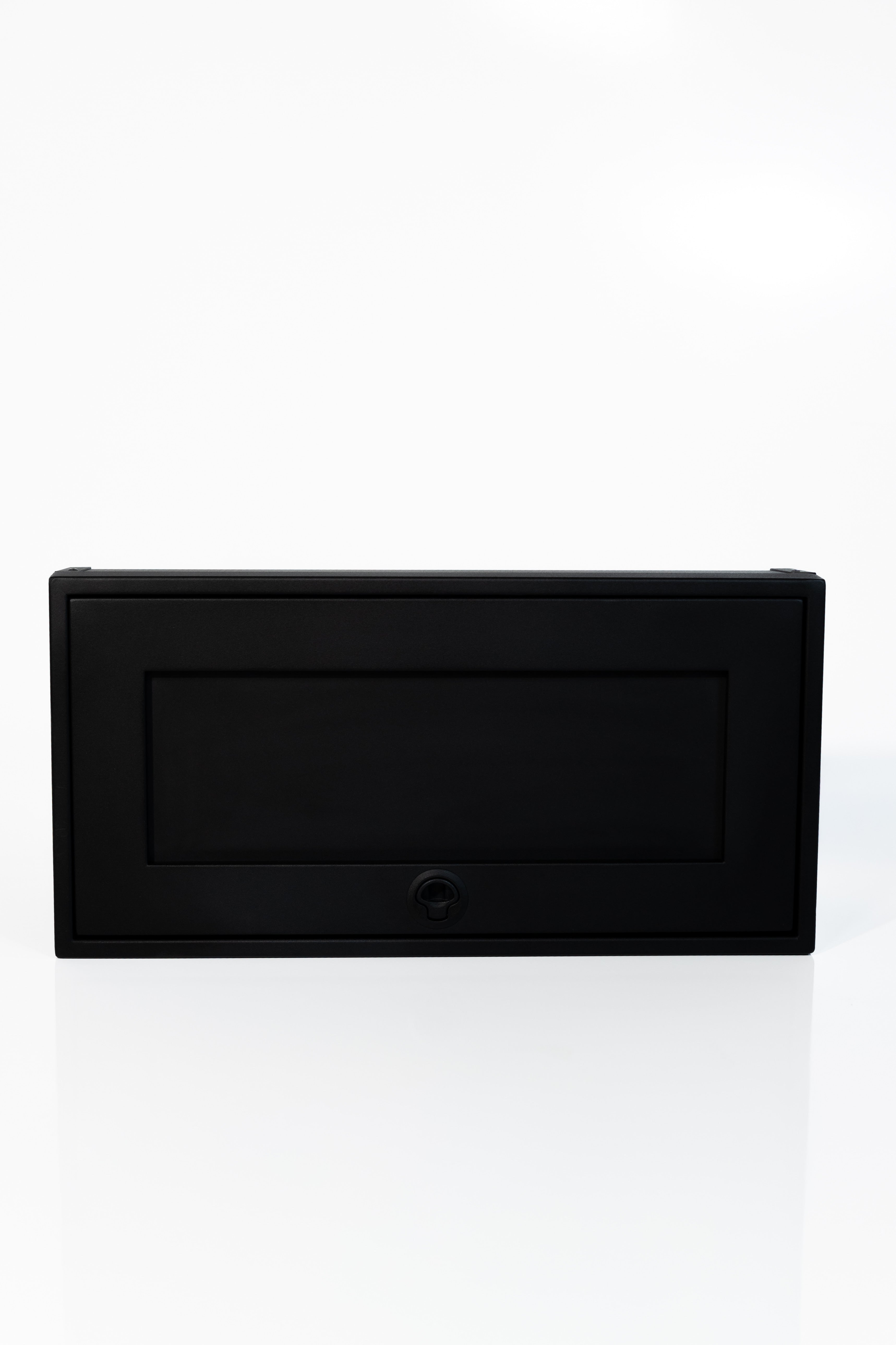 Black 30-inch wide aluminum angled upper Van Wife Components cabinet with a single shaker-style door & flush slam latch 