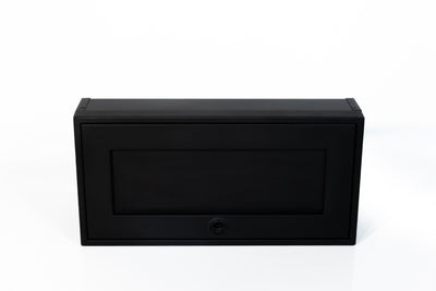 Black 30-inch wide aluminum angled upper Van Wife Components cabinet with a single shaker-style door & flush slam latch 