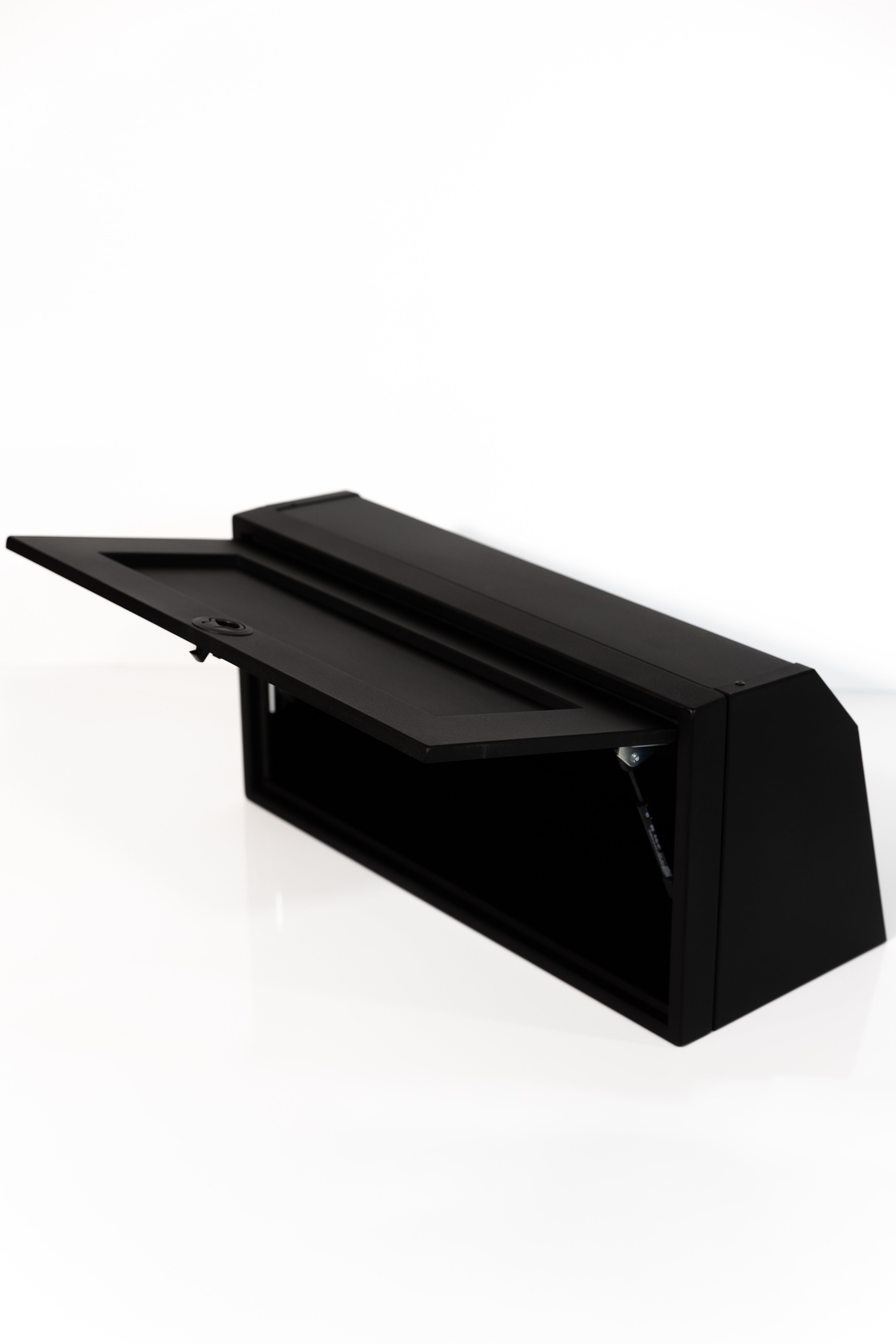 Black 30-inch wide aluminum angled upper Van Wife Components cabinet with a single shaker-style door & flush slam latch 
