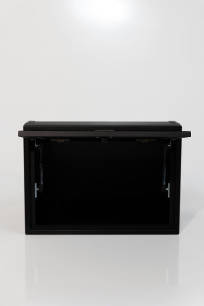 Black 21-inch wide aluminum angled upper Van Wife Components cabinet with a single shaker-style door & flush slam latch 