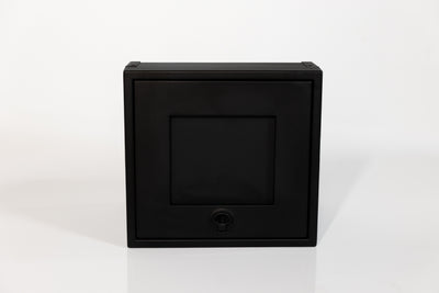 Black 16-inch wide aluminum angled upper Van Wife Components cabinet with a single shaker-style door & flush slam latch 