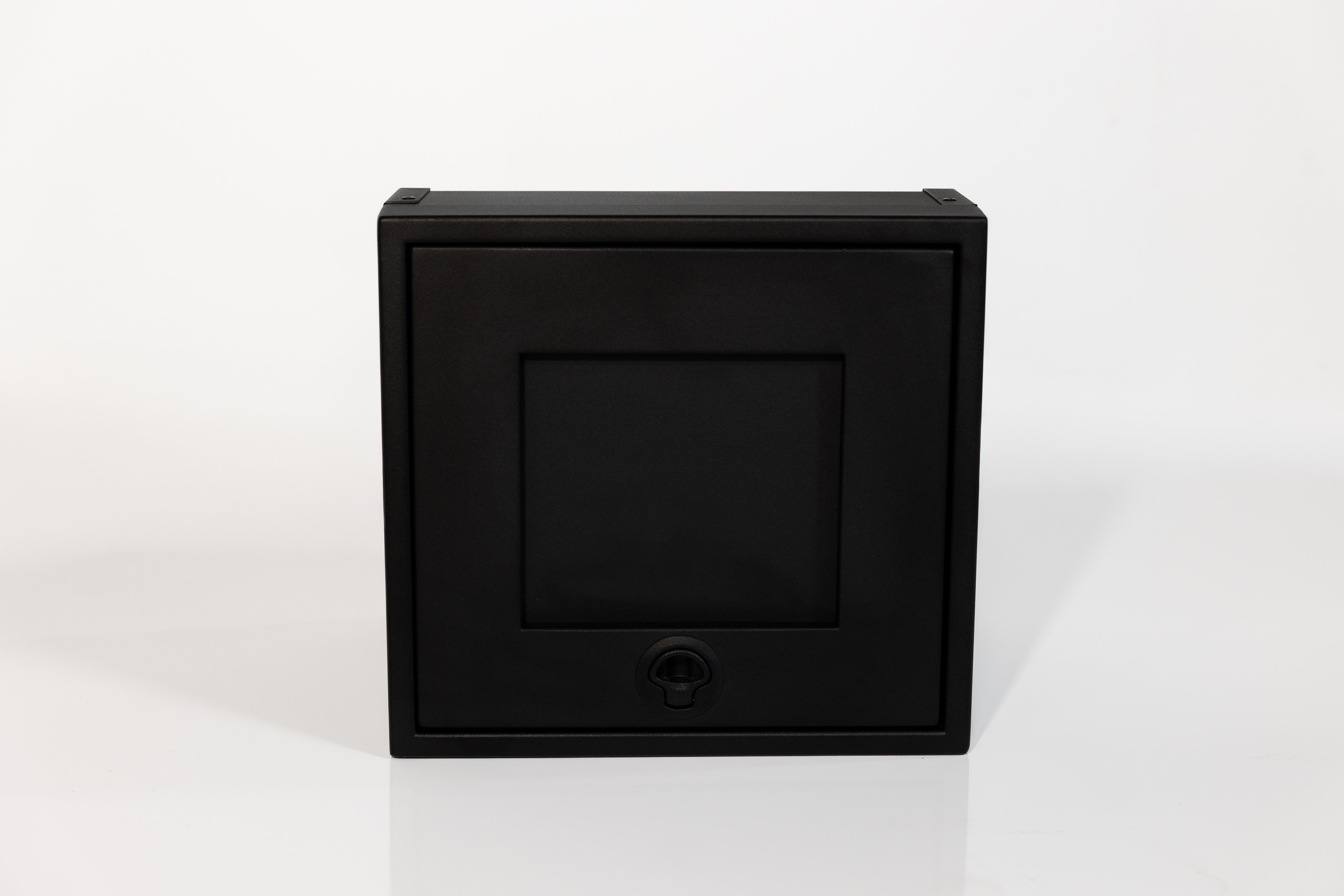 Black 16-inch wide aluminum angled upper Van Wife Components cabinet with a single shaker-style door & flush slam latch 