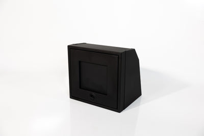 Black 16-inch wide aluminum angled upper Van Wife Components cabinet with a single shaker-style door & flush slam latch 