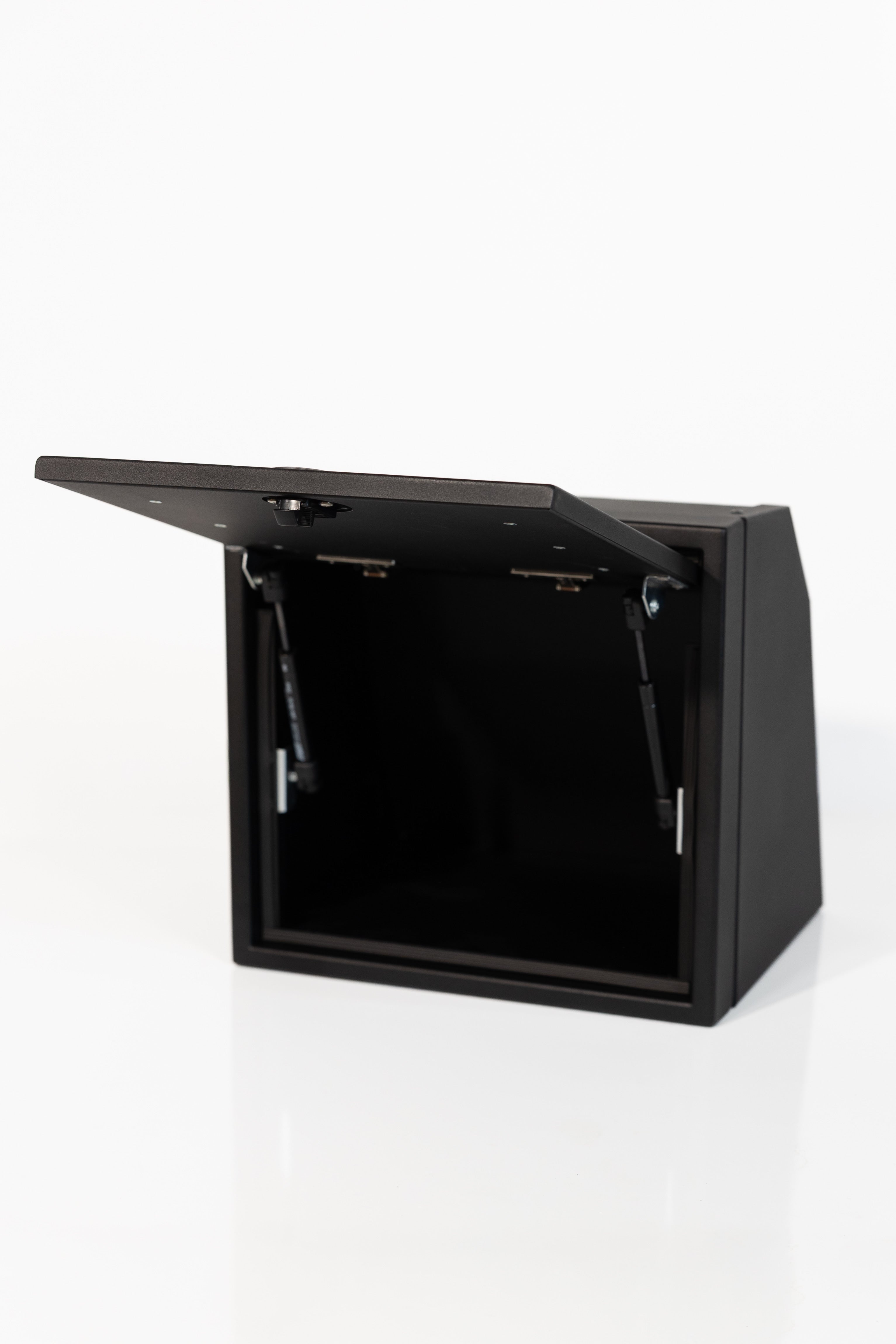 Black 16-inch wide aluminum angled upper Van Wife Components cabinet with a single shaker-style door & flush slam latch 