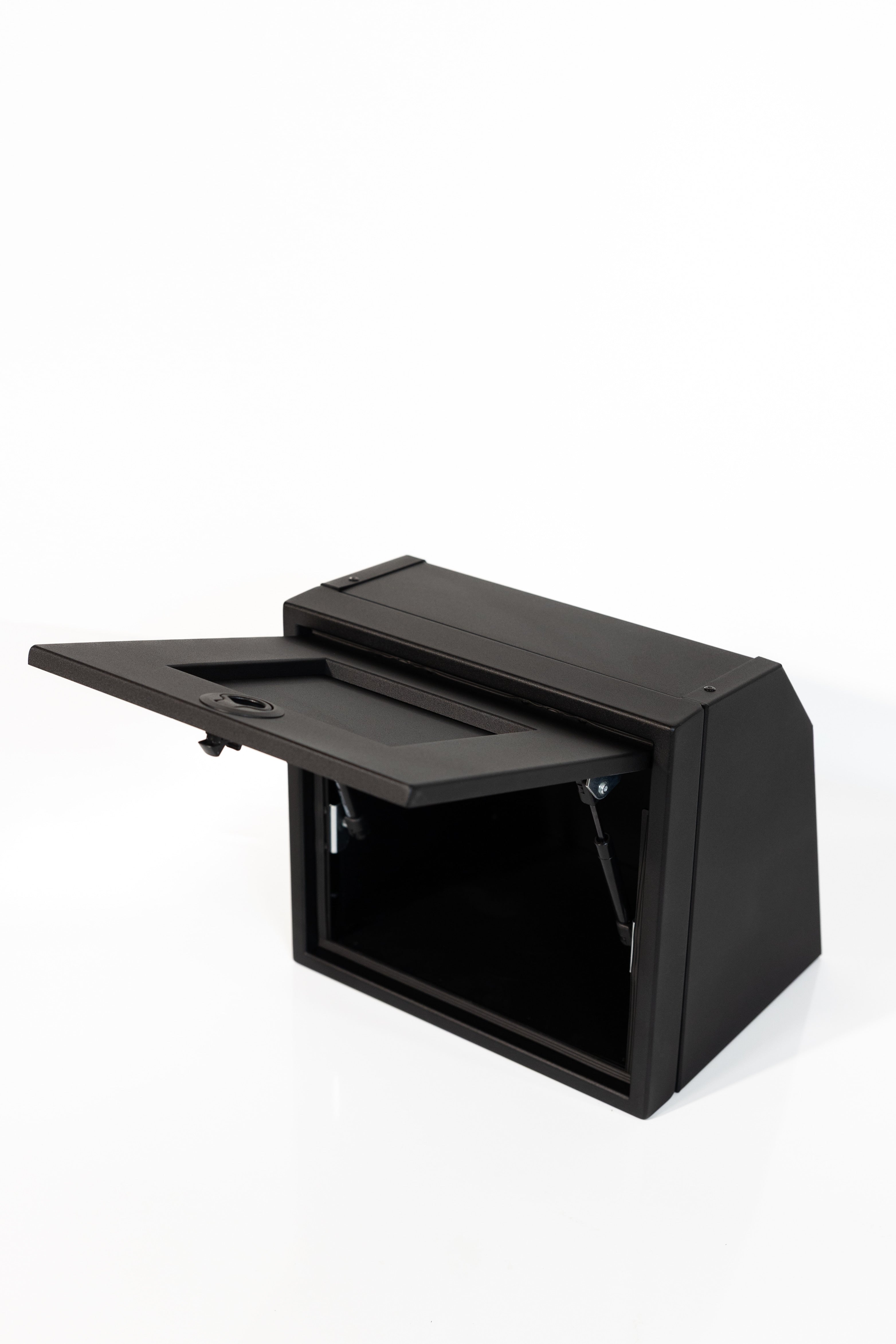 Black 16-inch wide aluminum angled upper Van Wife Components cabinet with a single shaker-style door & flush slam latch 