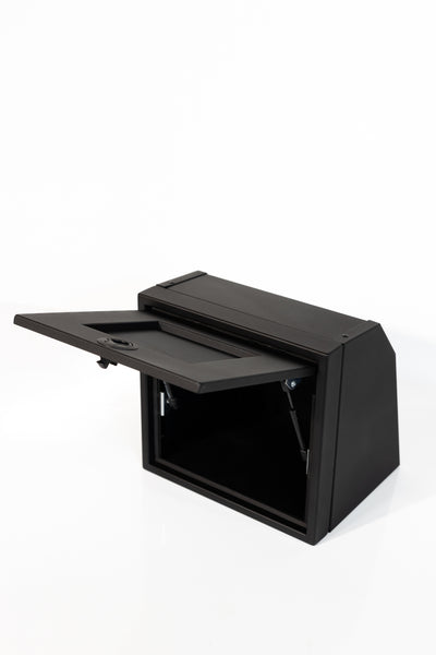 Black 16-inch wide aluminum angled upper Van Wife Components cabinet with a single shaker-style door & flush slam latch 