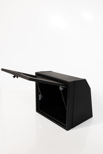 Black 16-inch wide aluminum angled upper Van Wife Components cabinet with a single shaker-style door & flush slam latch 