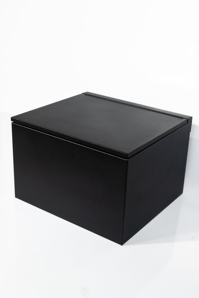 Black 24" x 22” x 16” aluminum storage bench with flip-top lid 
