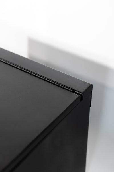 Black 24" x 22” x 16” aluminum storage bench with flip-top lid 

