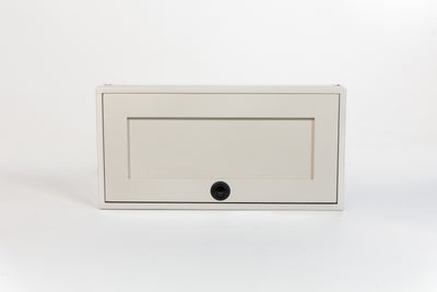 Sandstone 30-inch wide aluminum angled upper Van Wife Components cabinet with a single shaker-style door & flush slam latch 