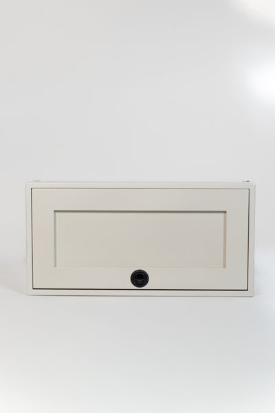 Sandstone 30-inch wide aluminum angled upper Van Wife Components cabinet with a single shaker-style door & flush slam latch 