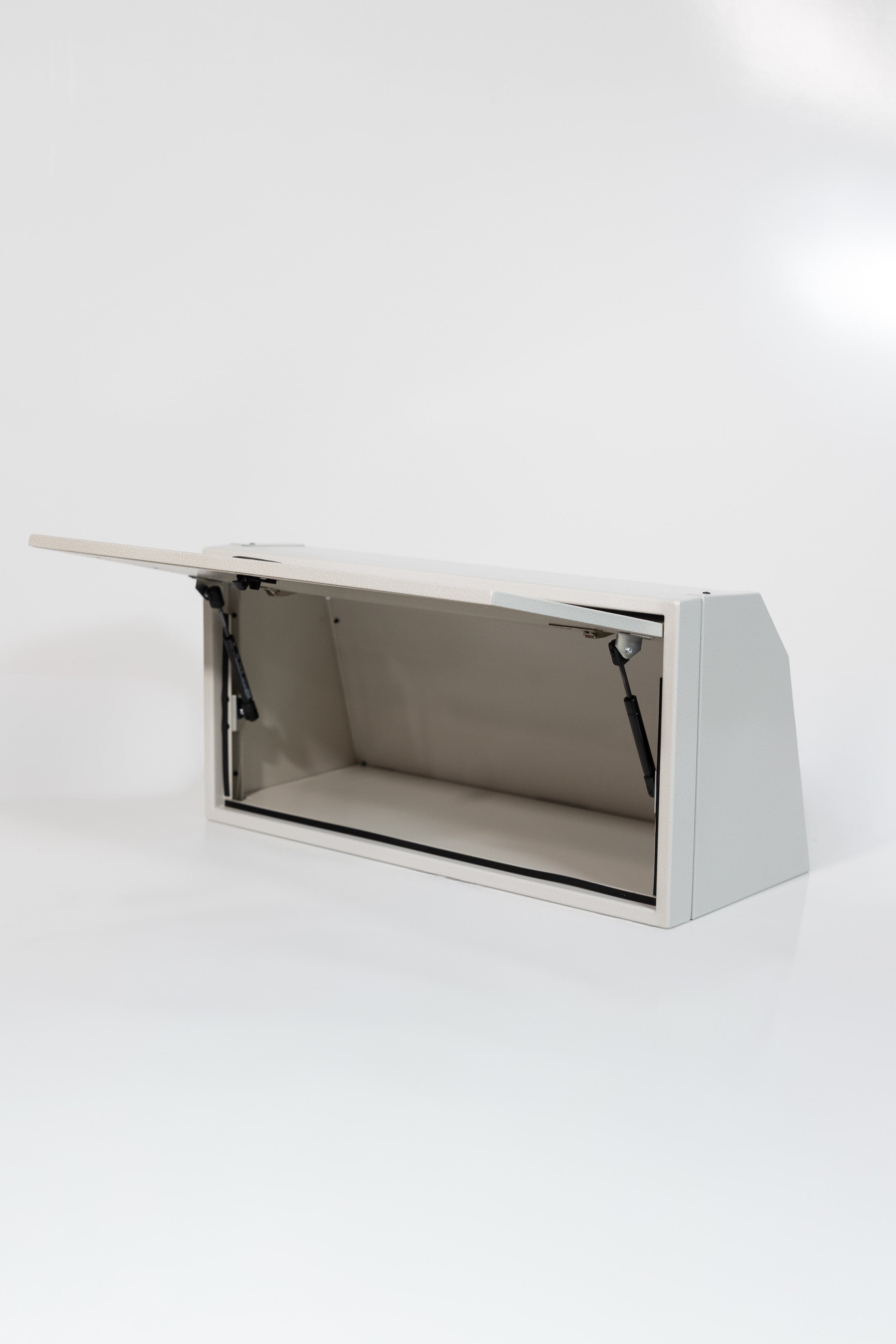 Sandstone 30-inch wide aluminum angled upper Van Wife Components cabinet with a single shaker-style door & flush slam latch 