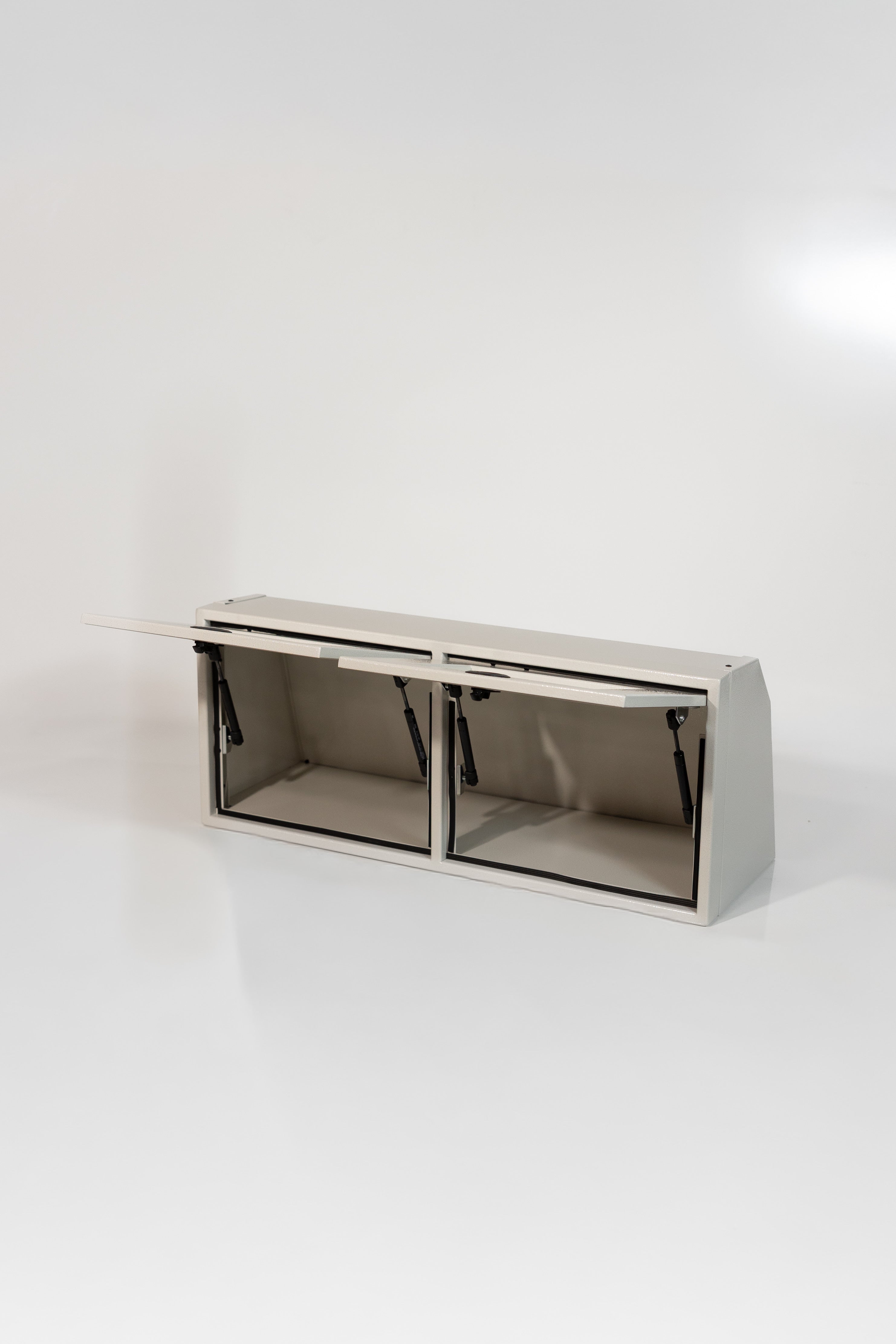 White 36-inch wide aluminum angled upper Van Wife Components cabinet with two shaker-style doors & flush slam latches 