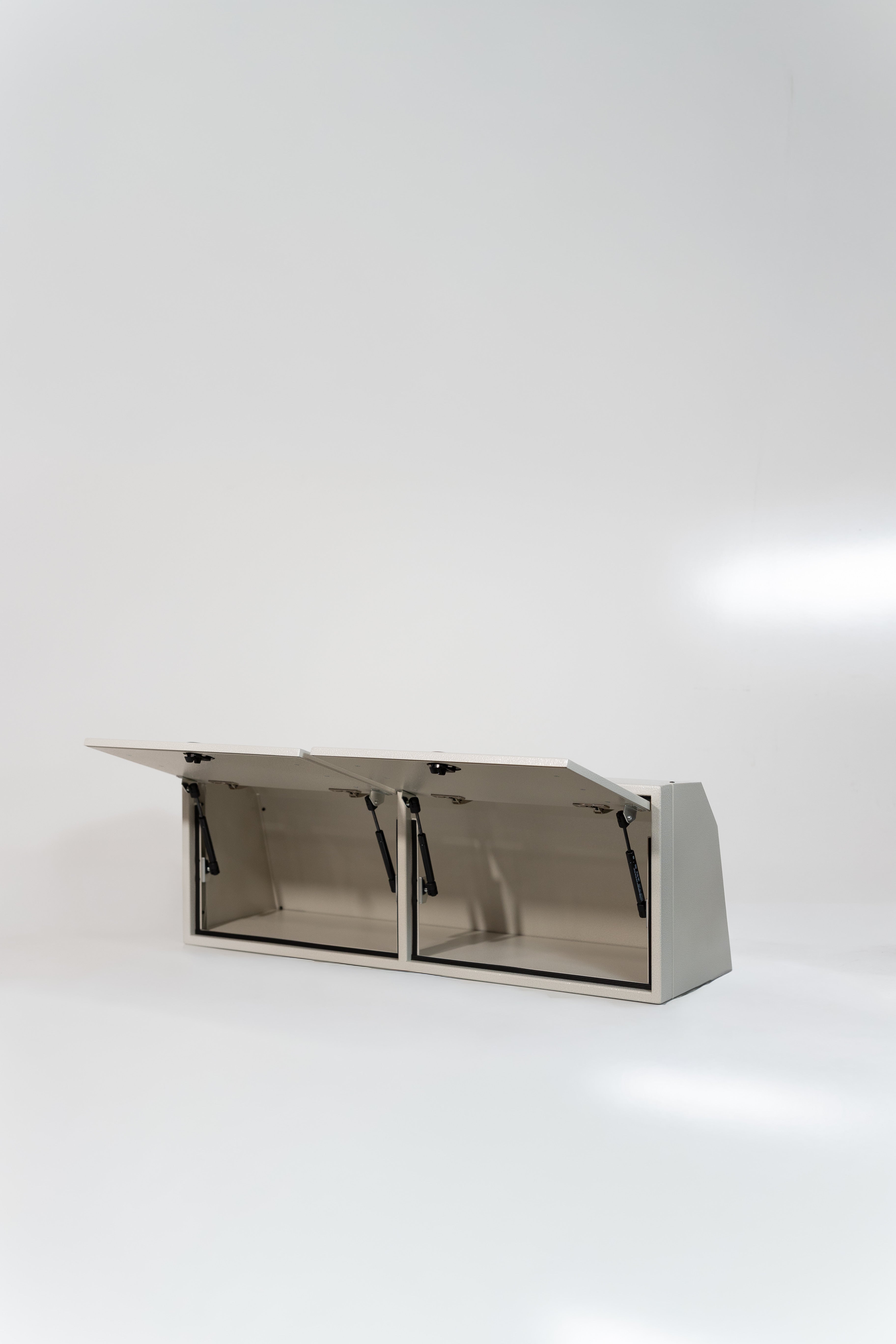 White 42-inch wide aluminum angled upper Van Wife Components cabinet with two shaker-style doors & flush slam latches