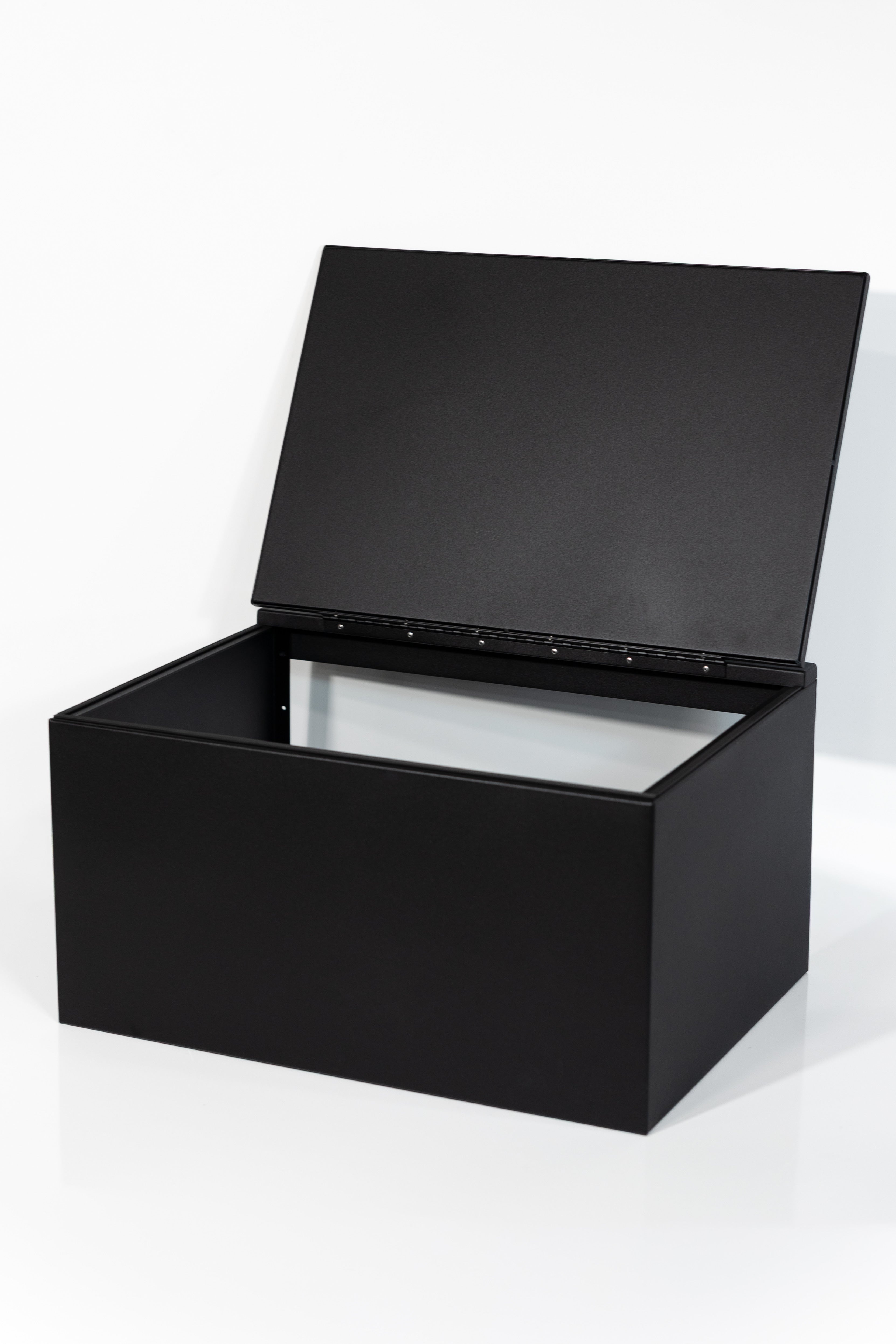 Black 30" x 22” x 16” aluminum storage bench with flip-top lid 
