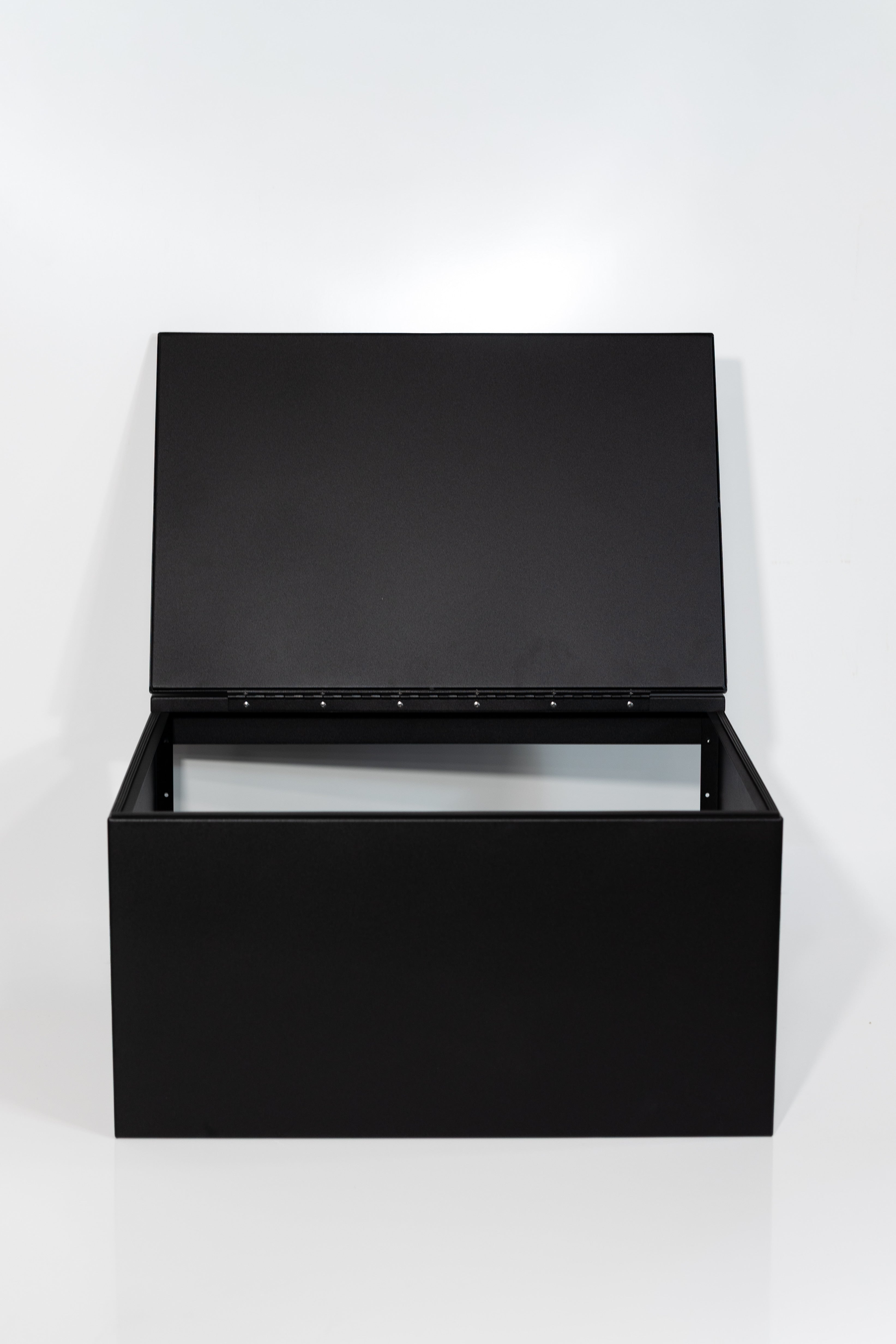 Black 30" x 22” x 16” aluminum storage bench with flip-top lid 
