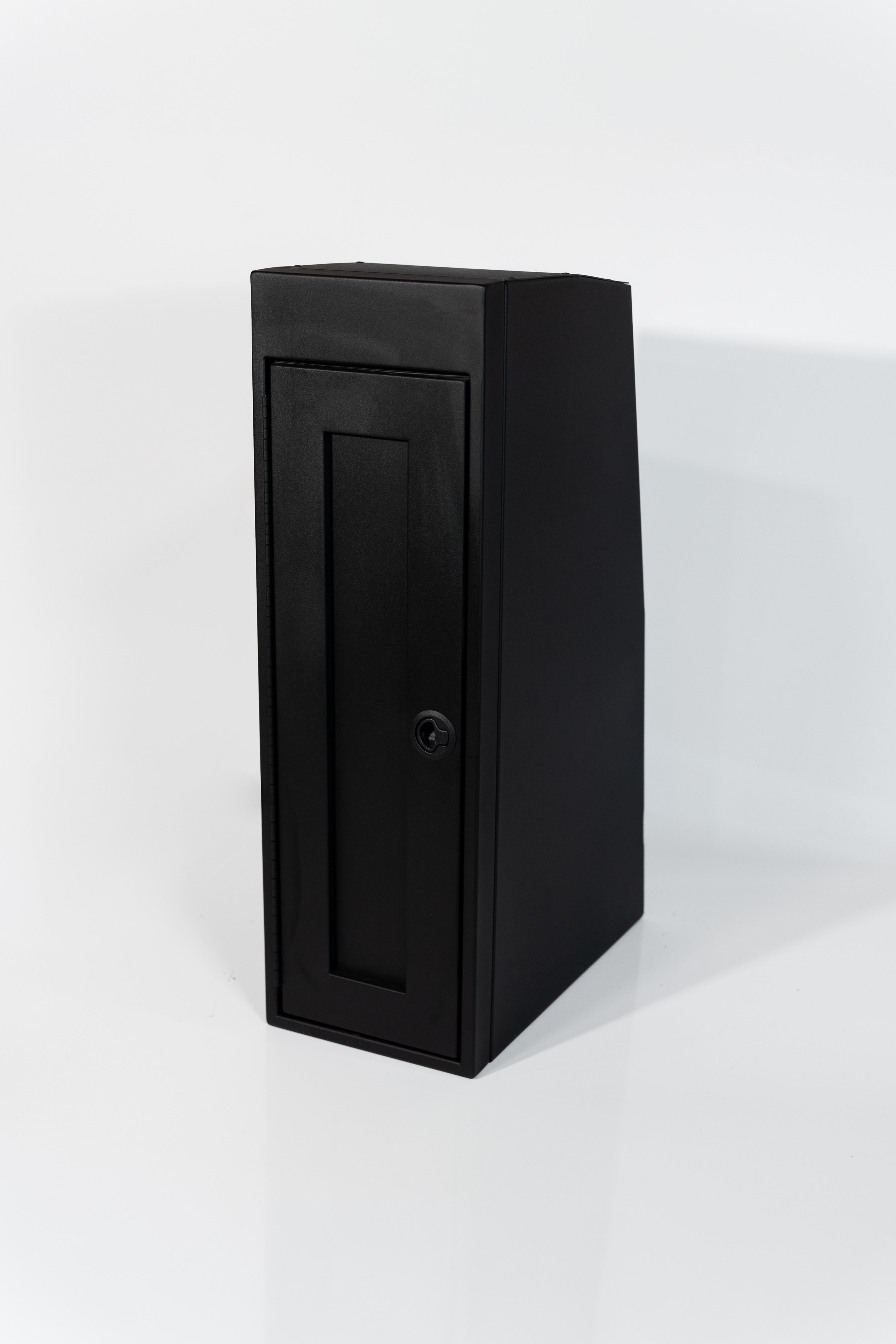 Black 12-inch wide vertical aluminum upper van closet showing a single shaker-style door with flush slam latch 