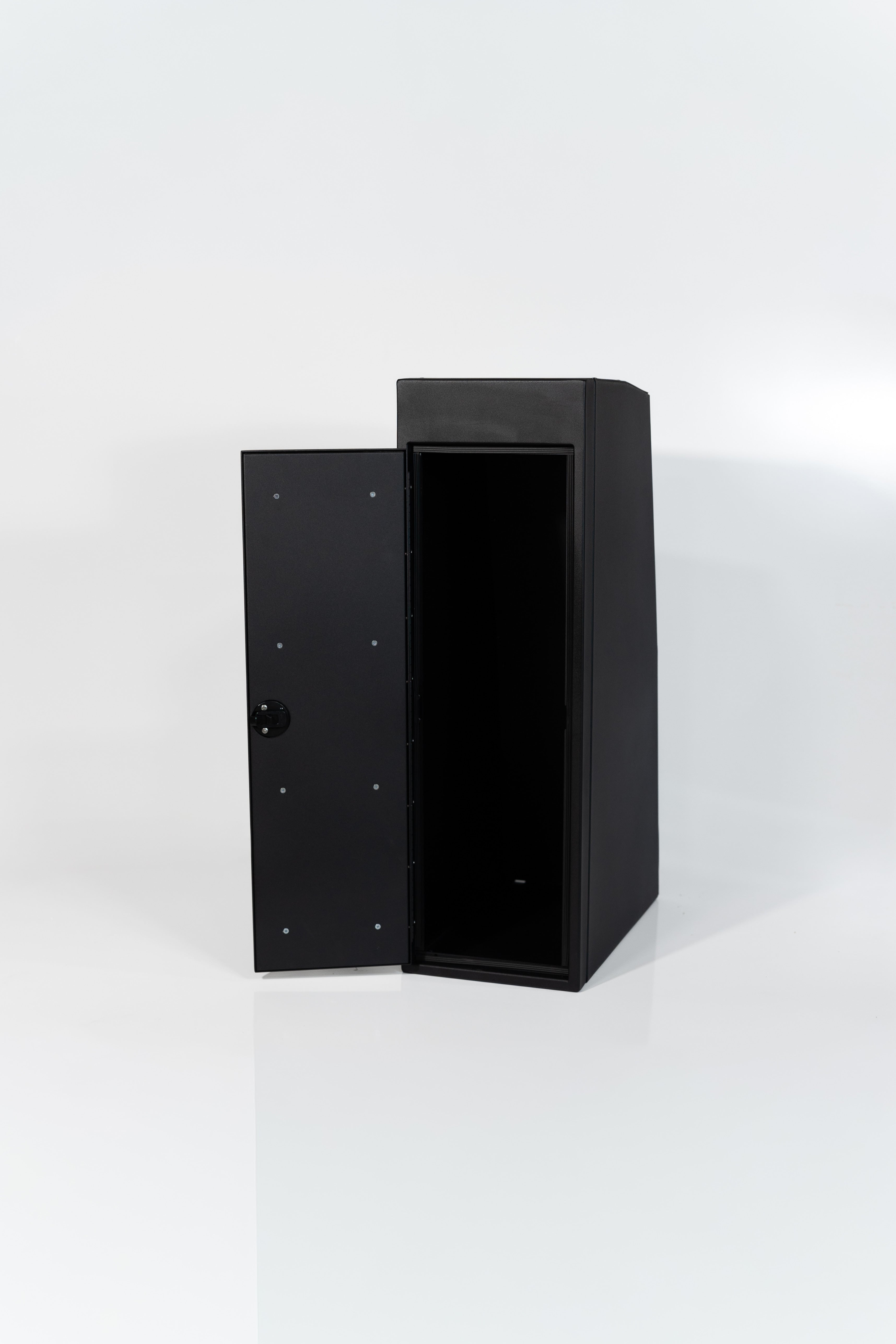Black 12-inch wide vertical aluminum upper van closet showing a single shaker-style door with flush slam latch 