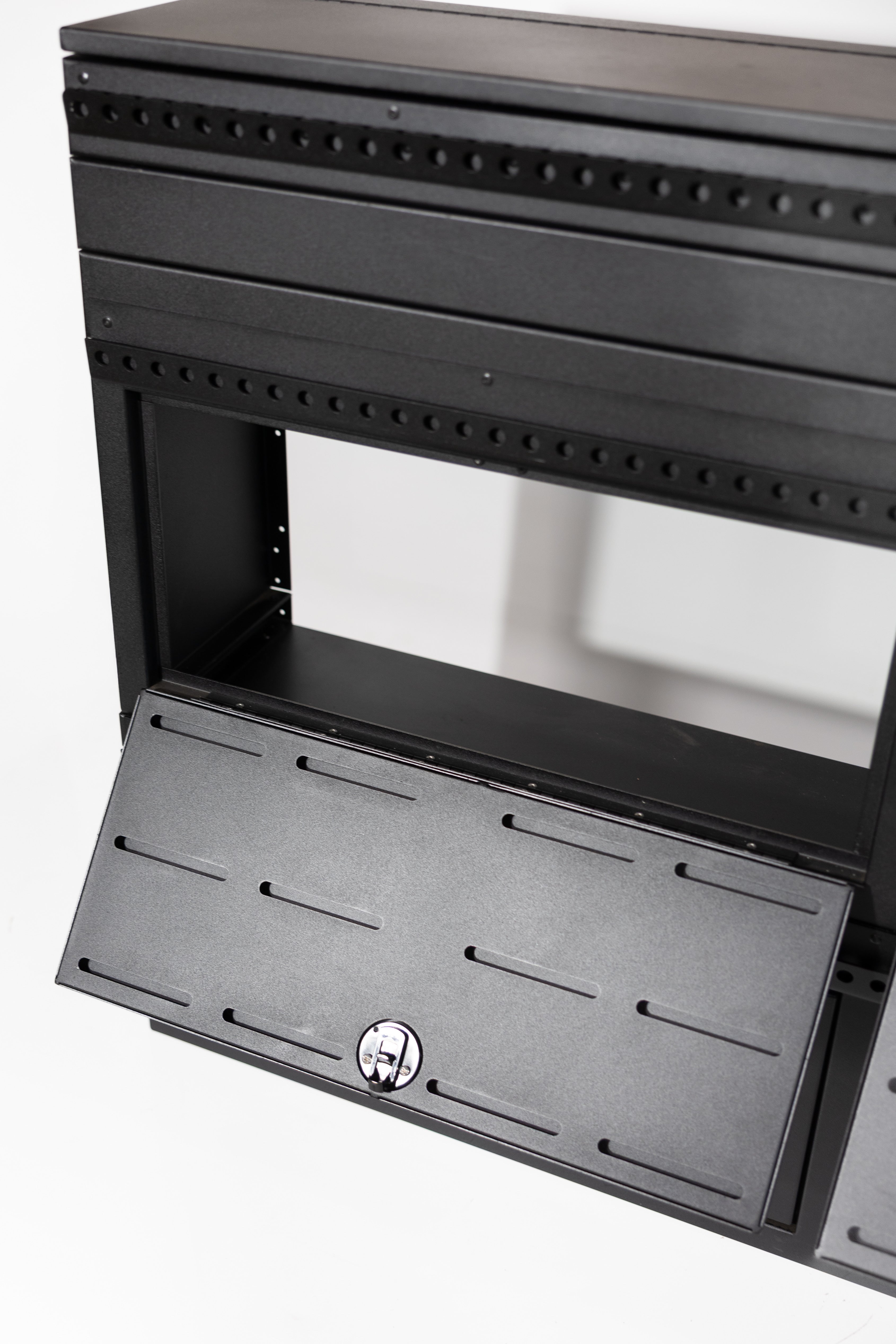 Fully assembled Black 12" wheel well covers - Stacked 2 levels high with optional risers, divider shelf, paired with hinged lid for a complete, finished look.
