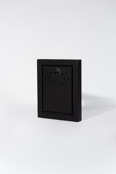 Black Powder-coated aluminum 12-inch face extension with flip-down door for Van Wife Components wheel well covers.