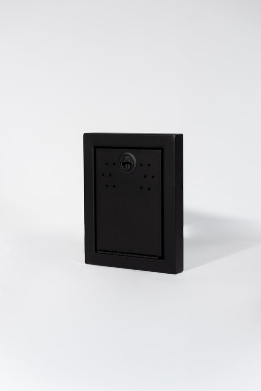 Black Powder-coated aluminum 12-inch face extension with flip-down door for Van Wife Components wheel well covers.