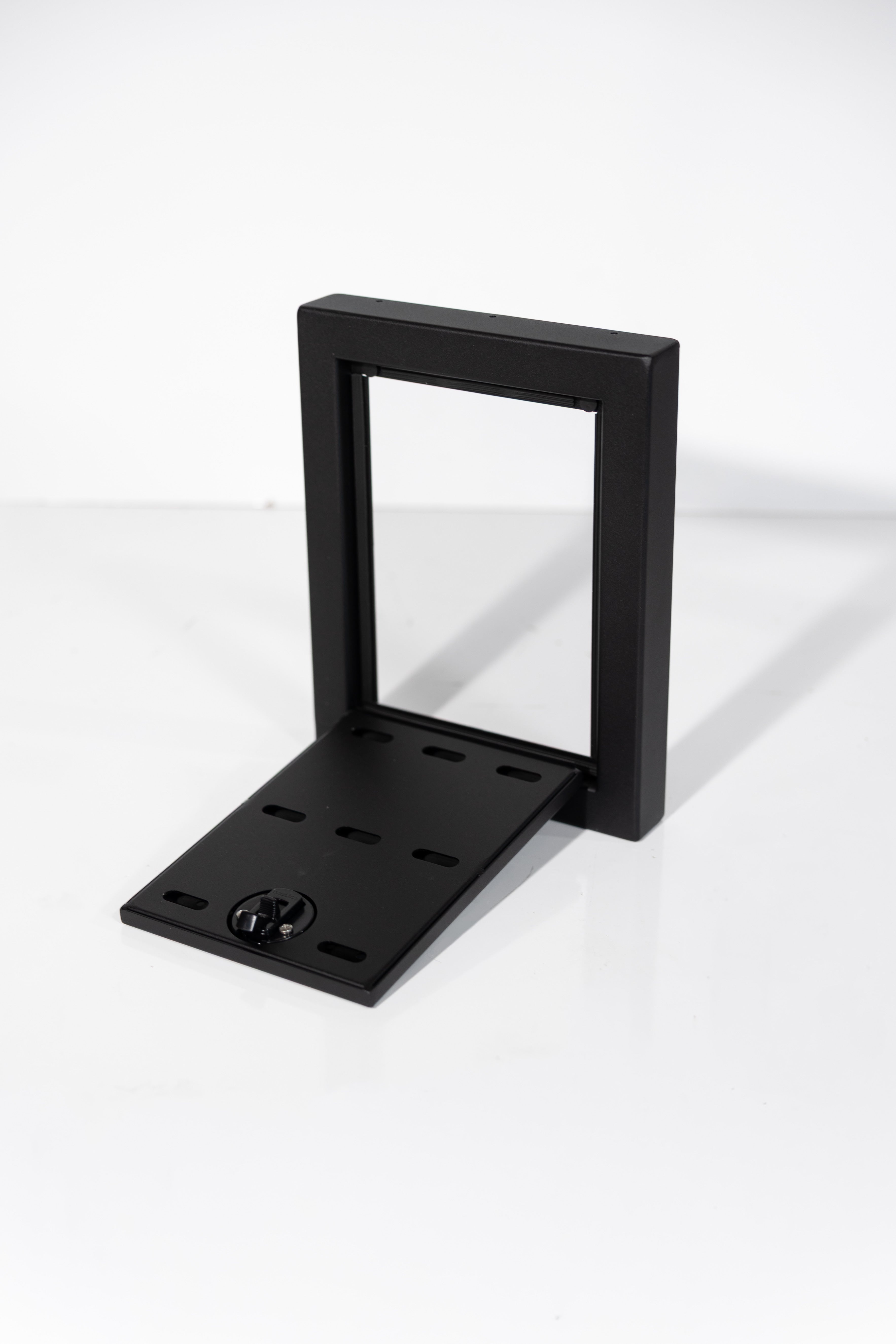 Black Powder-coated aluminum 12-inch face extension with flip-down door for Van Wife Components wheel well covers.