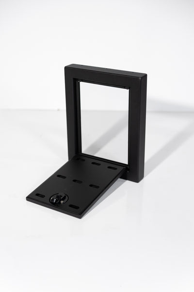 Black Powder-coated aluminum 12-inch face extension with flip-down door for Van Wife Components wheel well covers.
